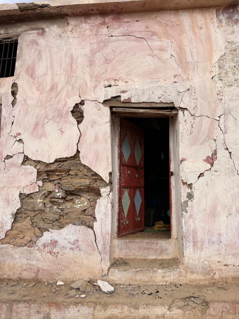 The door to Hamza Boumazough's damaged house 