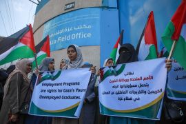 Dozens of graduates in Gaza gathered in front of UNRWA&#39;s headquarters in Gaza calling for creating job programmes [Abdelhakim Abu Riash/Al Jazeera]