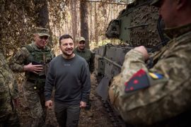 President Volodymyr Zelenskyy visited the front line between Lyman and Kupiansk on Tuesday [Office of the President of Ukraine via EPA]