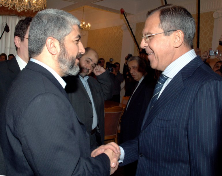 Hamas leader Khaled Meshaal (L) and Russia's Foreign Minister Sergei Lavrov shake hands as they meet in Moscow February 27, 2007. Meshaal praised Russia's efforts to end a Western aid embargo on the Palestinian administration during a visit to Moscow intended to win support for a new unity government. REUTERS/Pool (RUSSIA)