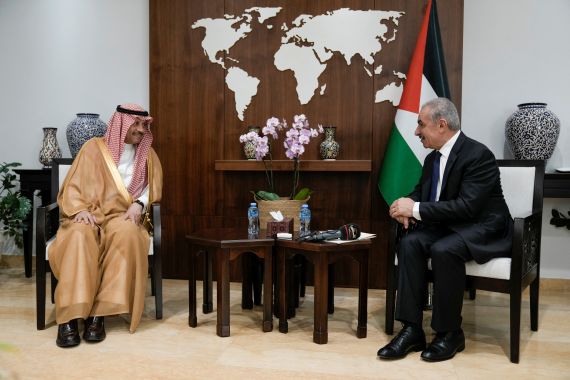 Nayef al-Sudairi, Saudi Arabia's first-ever Saudi ambassador to the Palestinian Authority, left, speaks with Palestinian Prime Minister Mohammad Shtayyeh, during their meeting in the West Bank city of Ramallah, Wednesday, Sept. 27, 2023