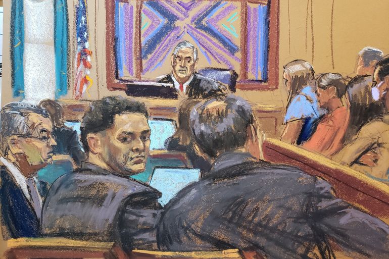 Sam Bankman-Fried sits beside his lawyer Christian Everdell on the first day of his fraud trial at a federal court in New York, US in this courtroom sketch