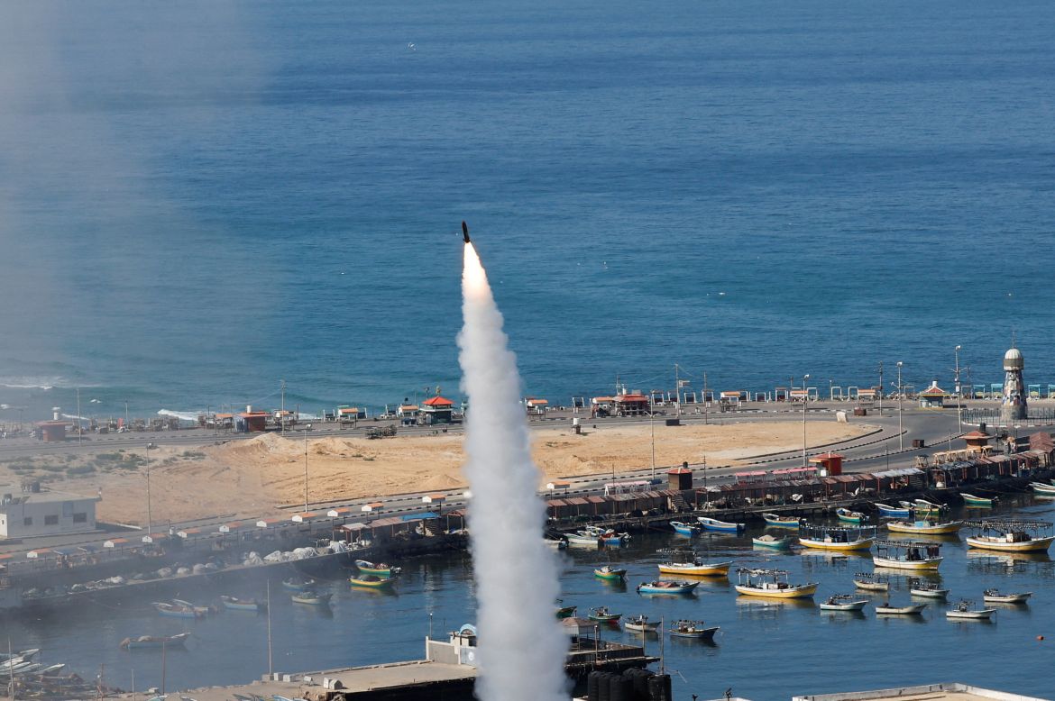 A rocket is fired by Palestinian militants into Israel, in Gaza City