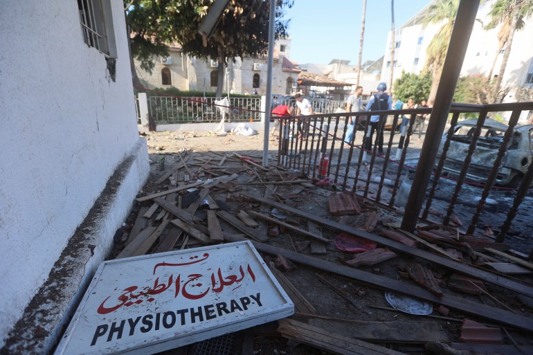A view of debris in the area of Al-Ahli hospital