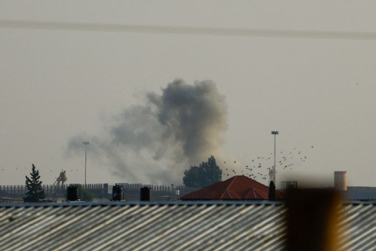 Smoke rises following Israeli strikes at the border with Egypt, as the conflict between Israel and Palestinian Islamist group Hamas continues, as seen from Rafah, southern Gaza Strip