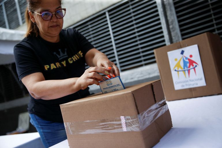 A woman casts her vote in a primary in Caracas Venezuela.