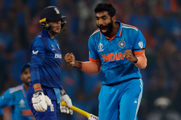 India's Jasprit Bumrah celebrates after taking the lbw wicket of England's Joe Root