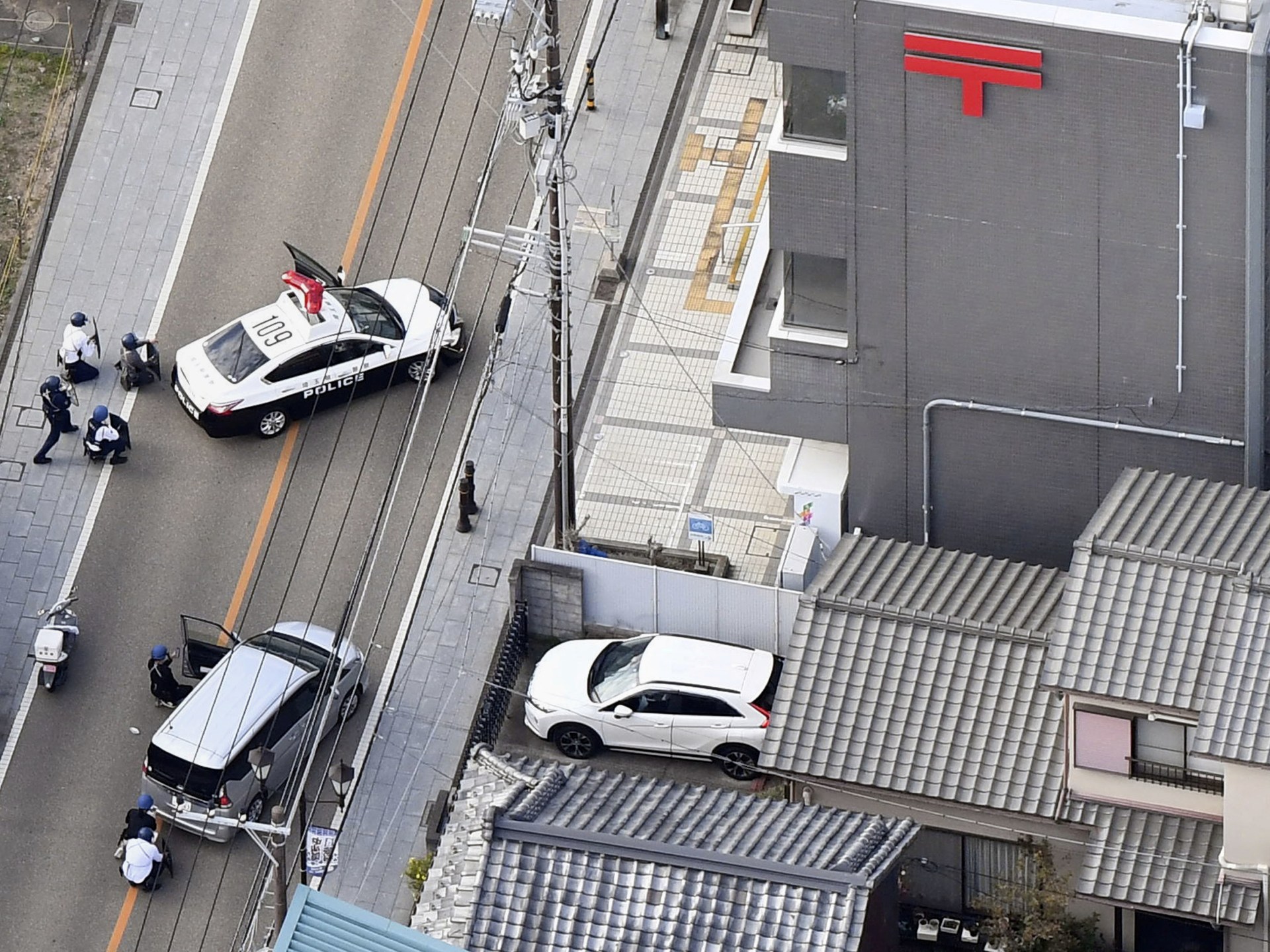 Japan police arrest suspected gunman after hostage standoff