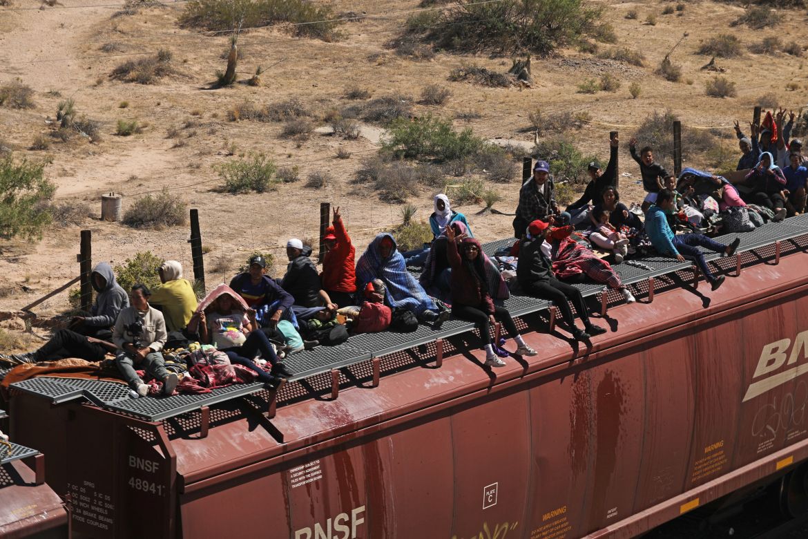 Migrant people, mostly from Venezuela, remain stranded after the goods train they were travelling on to Ciudad Juarez