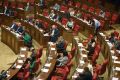 Armenian lawmakers attend a plenary session at the parliament
