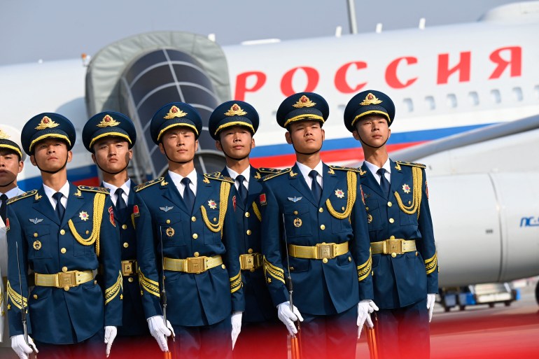 Chinese honour guards pictured in front of Putin's plane?