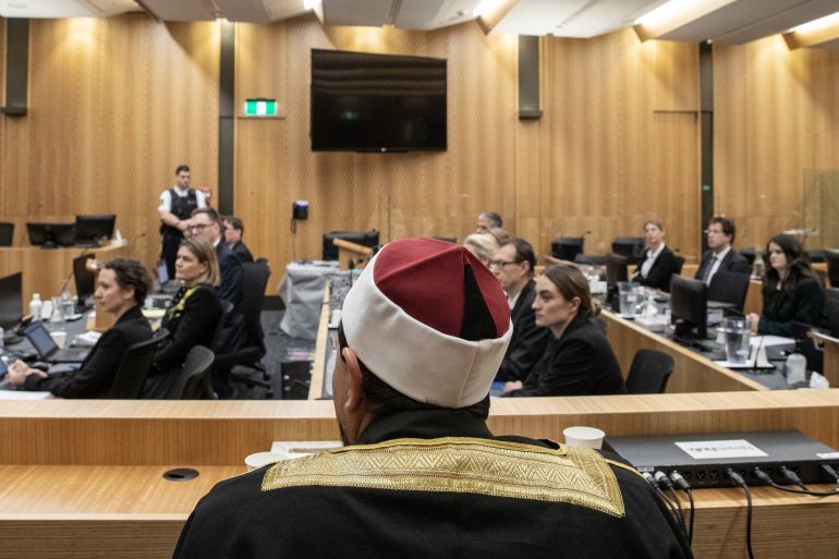 A view of the court at the start of the inquest into the Christchurch mosque attacks. The imam of the Al Noor Mosque is sitting closest to the camera.