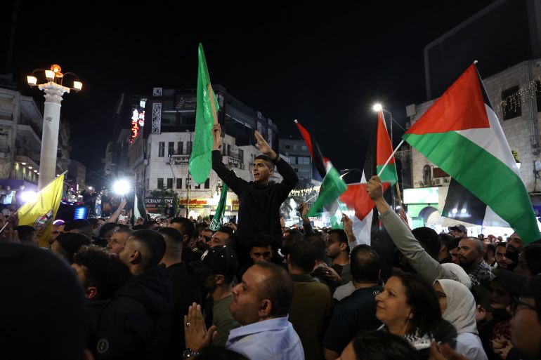 Palestinians attend a gathering in solidarity with the Gaza Strip, in the West Bank city of Ramallah