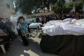A funeral service is held at St Porphyrius Orthodox Church in Gaza City for the people killed in an Israeli bombardment of the church complex on October 20, 2023 [Abdelhakim Abu Riash/Al Jazeera]
