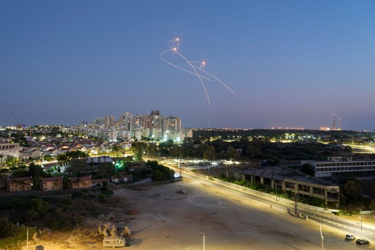 Israel's Iron Dome anti-missile system fires to intercept rockets launched from the Gaza Strip towards Israel, in Ashkelon.