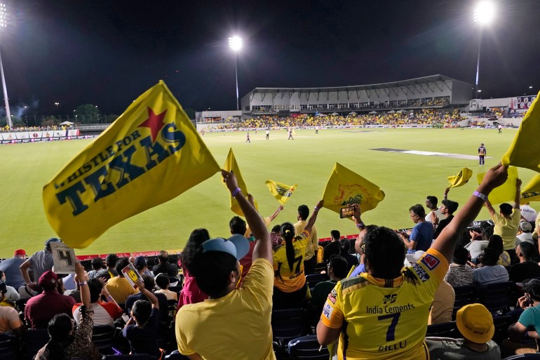 Fans in the stands watch the Texas Super Kings and Los Angeles Knight Riders compete in a Major League Cricket match in Grand Prairie, Texas, Thursday, July 13, 2023. (AP Photo/LM Otero)