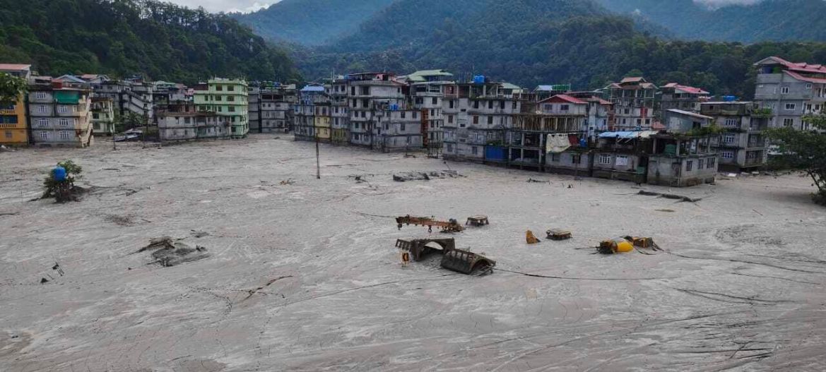 Buildings are inundated after flash floods triggered by sudden heavy rainfall swamped Rangpo town in Sikkim