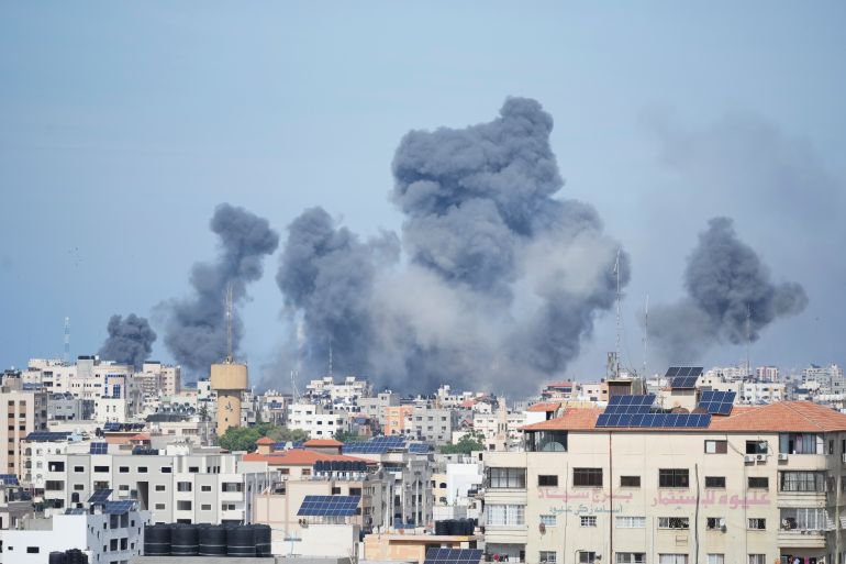 Smoke rises from an explosion caused by an Israeli airstrike in the Gaza Strip
