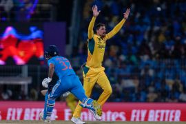 Australia's Mitchell Starc appeals unsuccessfully for the wicket of India's captain Rohit Sharma