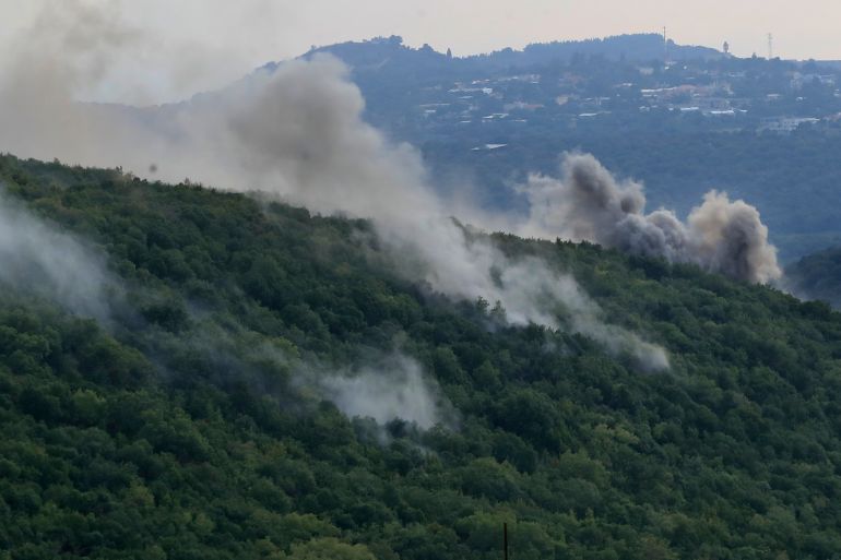 Smoke rises from Israeli shelling, in the Aita al-Shaab village, south Lebanon, Monday, Oct. 9, 2023.