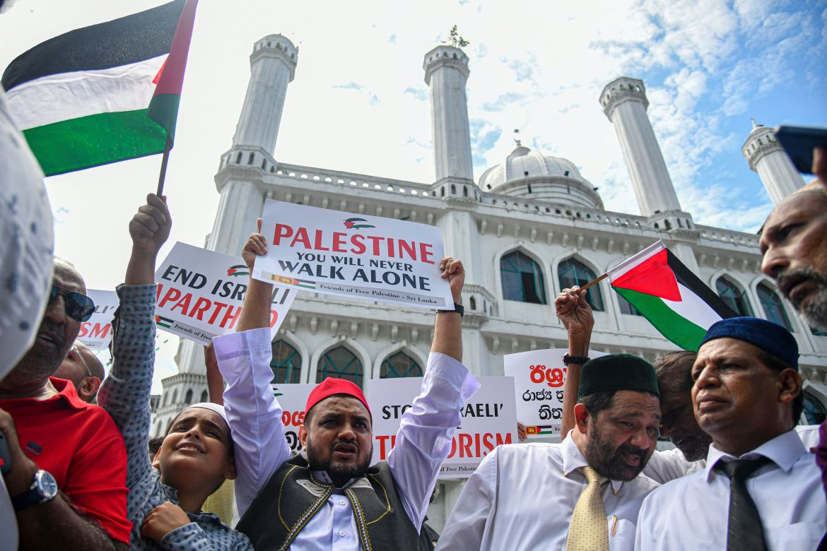 Sri Lankan Muslims participate in a protest against Israeli airstrikes on Gaza