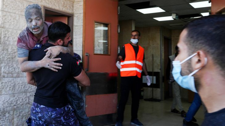 Palestinians wounded in Israeli air strikes on Gaza Strip are brought to al-Aqsa hospital in Deir el-Balah City, Gaza