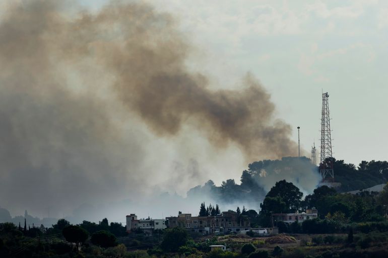 Smoke rises from an Israeli army position which was attacked by Hezbollah fighters near Alma al-Shaab a Lebanese border village with Israel