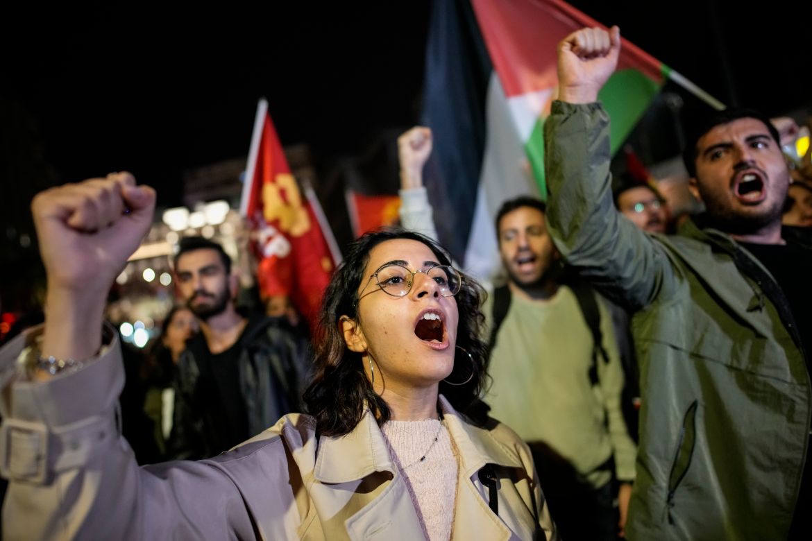People shout slogans during a protest by Turkish Communist party to show solidarity with Palestinians, in Istanbul