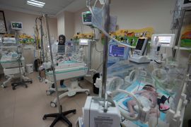 Palestinian doctors treat a prematurely born baby at Al Aqsa Hospital in Deir el-Balah, Gaza Strip, Sunday, Oct. 22, 2023. (AP Photo/Adel Hana)