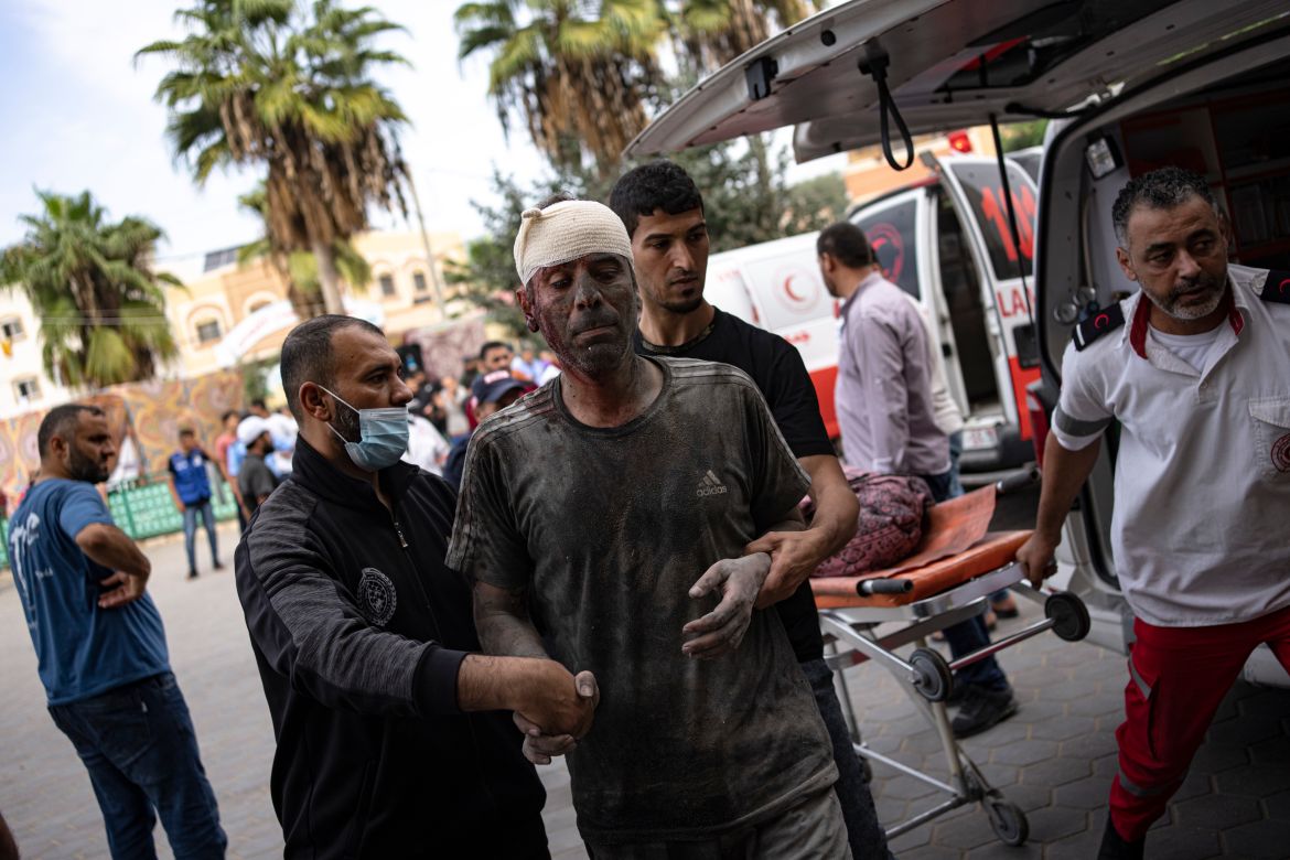 Palestinian wounded in Israeli bombardment is brought to a hospital in Deir al Balah, south of the Gaza Strip