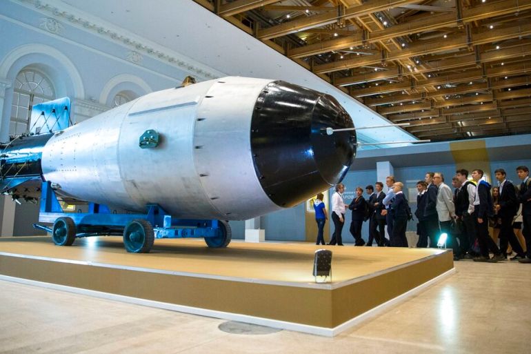 People look at a replica of a Soviet AN-602, or Tsar Bomb, the most powerful nuclear bomb ever detonated, which is now on display at Manezh in Moscow, Russia, Tuesday, Sept. 1, 2015. (AP Photo/Pavel Golovkin)