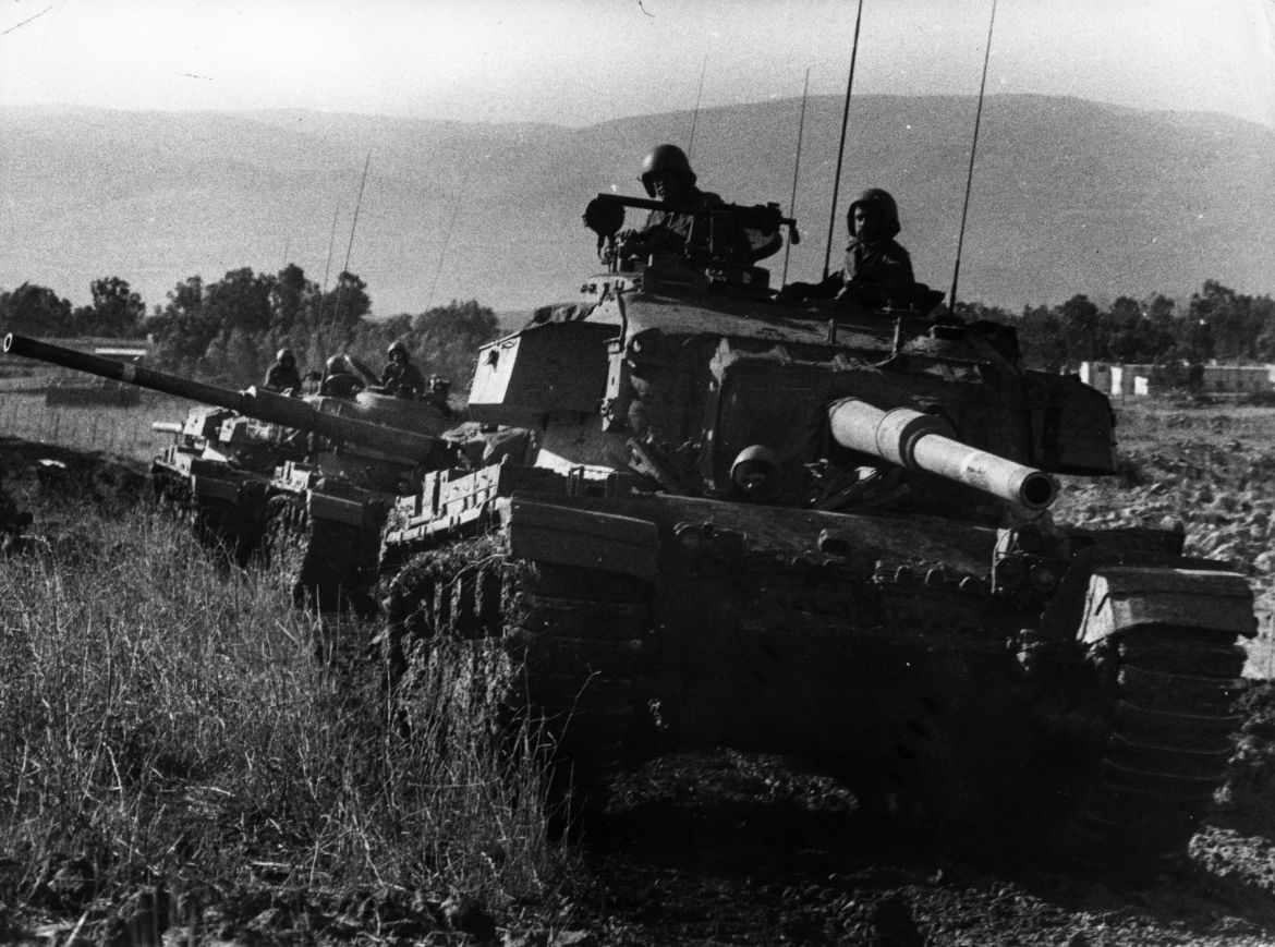 Israeli troops advance during the battle in the Golan Heights during the Yom Kippur War.