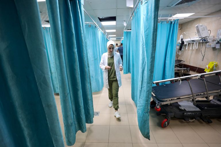 Alaa Kassab is a surgical volunteer at Al-Aqsa Martys Hospital's emergency room in Deir al-Balah, central Gaza Strip