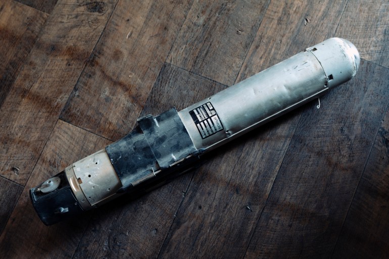 An unspent casing from Israeli made drone rocket designed to explode on impact ejecting metal cubes out from a copper canister. The projectile spools out at a velocity designed to cut a human in half from the midriff.
