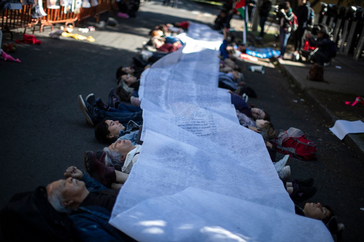 People take part in a Pro-Palestinian protest of the organizations Amistad and Plataforma Comun de Apoyo a Palestina in front of the Israeli embassy in Mexico City, Mexico.