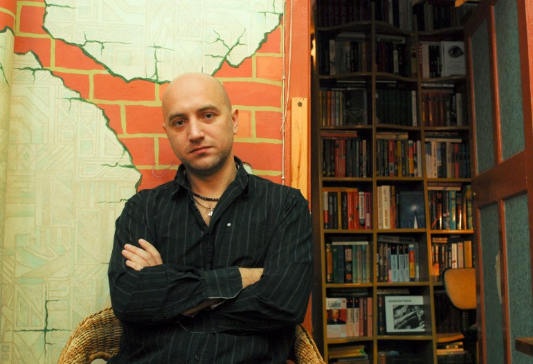Russian writer Zakhar Prilepin poses for a picture in his flat in Nizhny Novgorod in the Volga region, in this December 6, 2008 photo. A prominent banker and a popular leftist writer locked horns in a public debate over a social divide in crisis-hit Russia, revealing a growing social antagonism in a seemingly controlled Russian society. To match feature RUSSIA-DEBATE REUTERS/Mikhail Beznosov (RUSSIA)