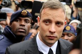 Olympic and Paralympic track star Oscar Pistorius leaves court