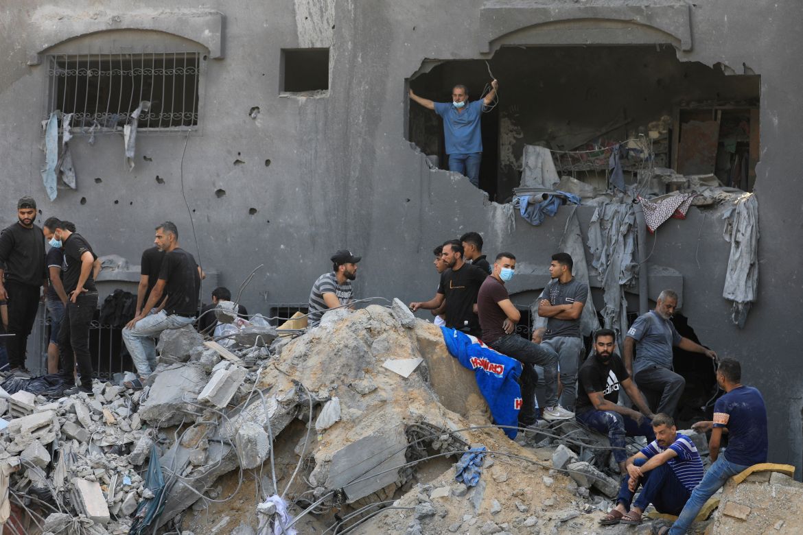 Palestinians search for casualties a day after Israeli strikes on houses in Jabalia refugee camp in the northern Gaza Strip.
