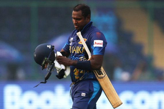 Sri Lanka's Angelo Mathews walks after losing his wicket