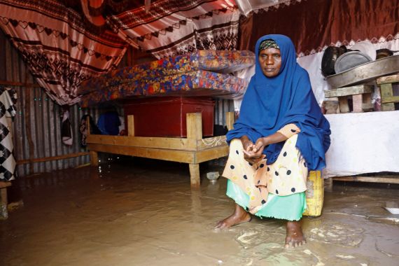 Fatima Abdi, 50, an internally displaced Somali woman sits inside her flooded makeshift shelter, following heavy rains at the Al Hidaya camp for the internally displaced people on the outskirts of Mogadishu, Somalia November 6, 2023 REUTERS/Feisal Omar TPX IMAGES OF THE DAY