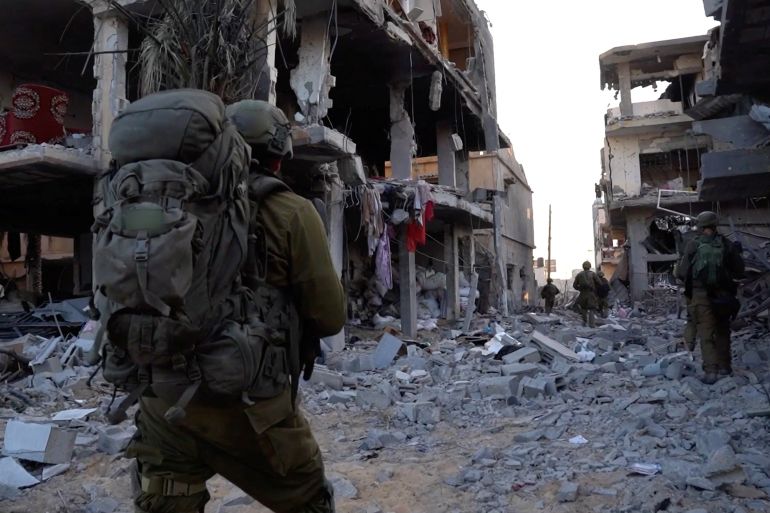 Israeli soldiers operate inside the Gaza Strip