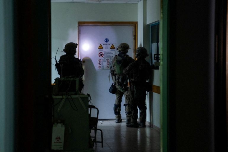 Israeli soldiers inspect the al-Shifa Hospital complex, amid their ground operation against Palestinian Islamist group Hamas, in Gaza City, November 15, 2023