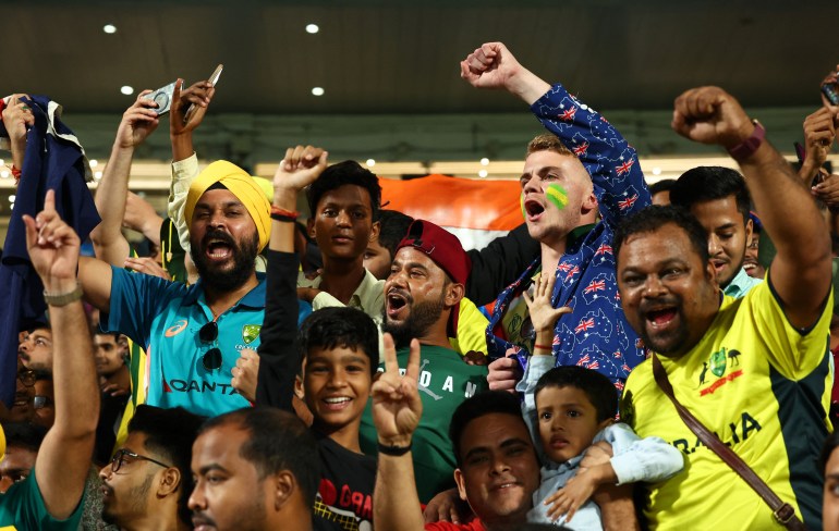 Fans cheer after the match