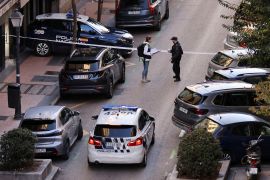 Police work at the site where Alejo Vidal-Quadras, former head of Spain's People's Party in the Catalonia region, was shot in the face, in Madrid, Spain