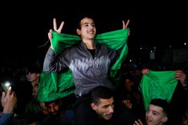 Released Palestinian prisoners react as they leave the Israeli military prison, Ofer