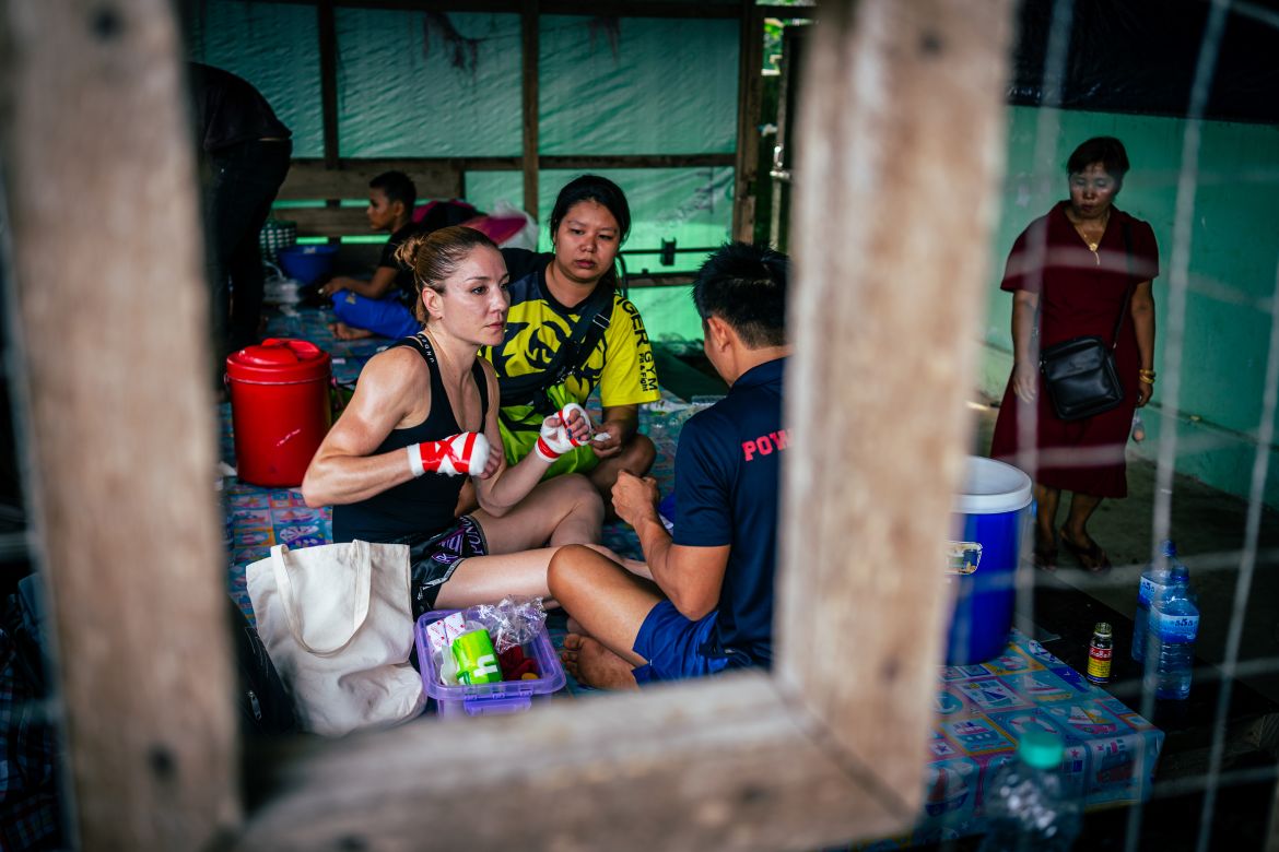 Inside a small caged shed adjacent to the hangar, 39-year-old Swedish national Helene Thor prepares for the final fight of the day and her fourth lethwei bout.