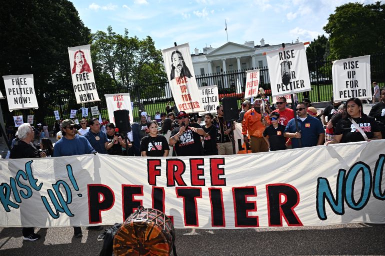 Indigenous rights activists take part in a rally in support of imprisoned Native American activist Leonard Peltier, at Lafayette Square across from the White House, in Washington, DC, on September 12, 2023
