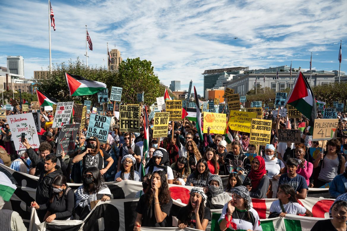 People take part in a "Palestine Solidarity" march in San Francisco, California, on November 4
