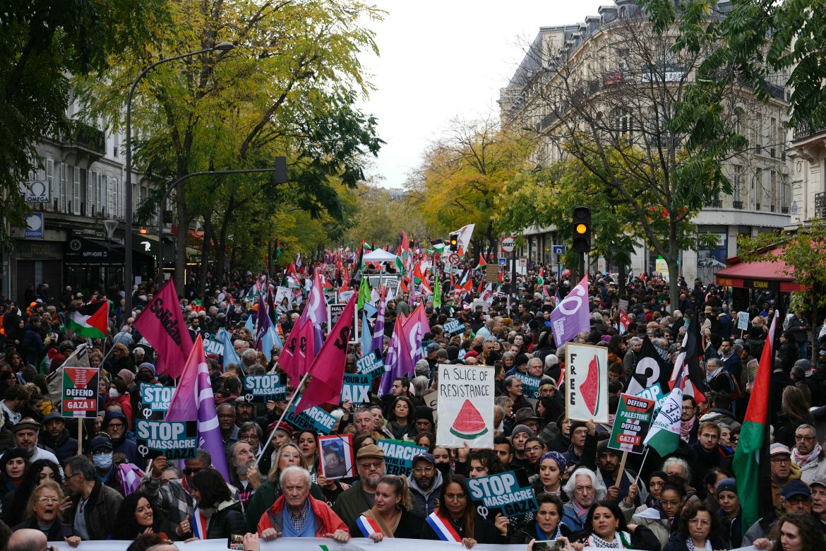 Protesters, including left-wing coalition NUPES (New People's Ecologic and Social Union) - French leftist party La France Insoumise's (LFI) member of Parliament Mathilde Panot (C), take part in a demonstration to demand an immediate ceasefire in Gaza at Place de la Republique in Paris.