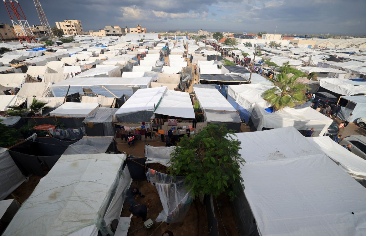 A view of makeshift shelters and tents set up by internally displaced Palestinians who fled from the Israeli bombardment of the northern Gaza Strip are pictured in Khan Yunis, in the southern Gaza Strip.